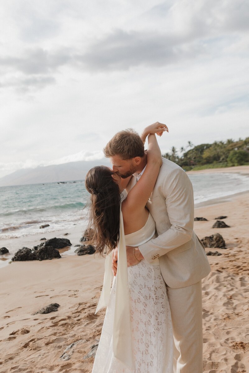 bridge and groom on beach