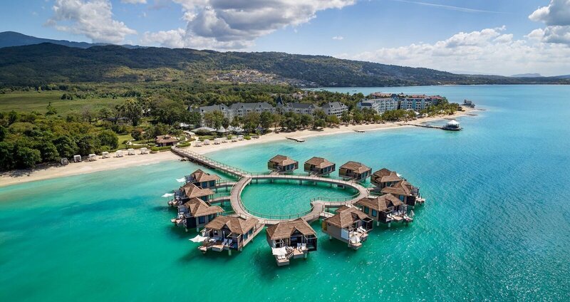 Bungalows on vacation to show honeymoon travel planner GG Mack Luxe Travel