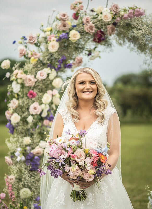Bride holding bouquet 237