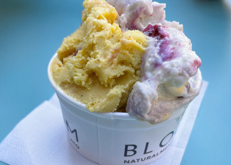 Cup of gelato with three flavors from Bloom in Modena, Italy