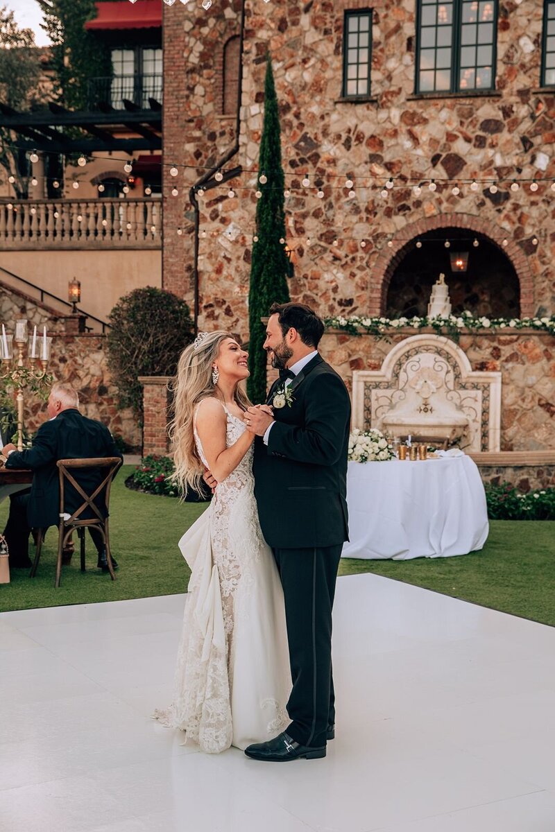 bride and grooms first dance at bella collina