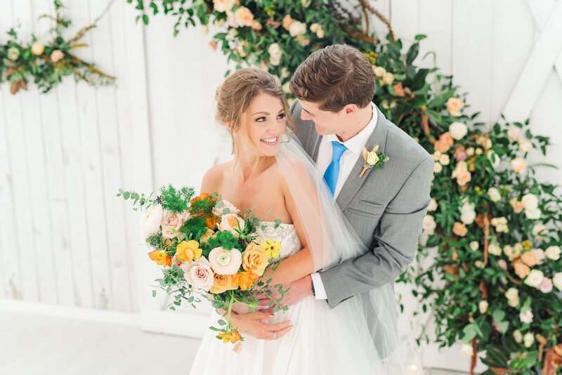 bride and groom at idaho wedding venue sharing a moment