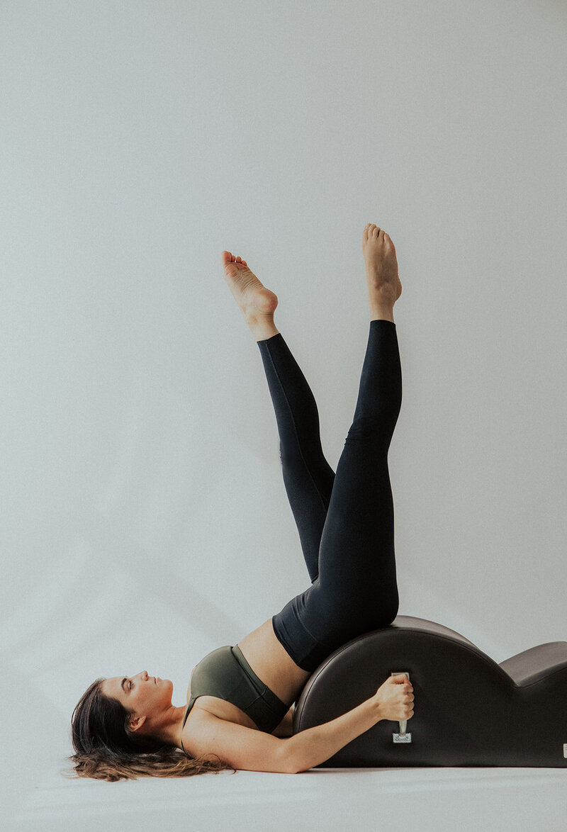 fitness instructor doing pilates