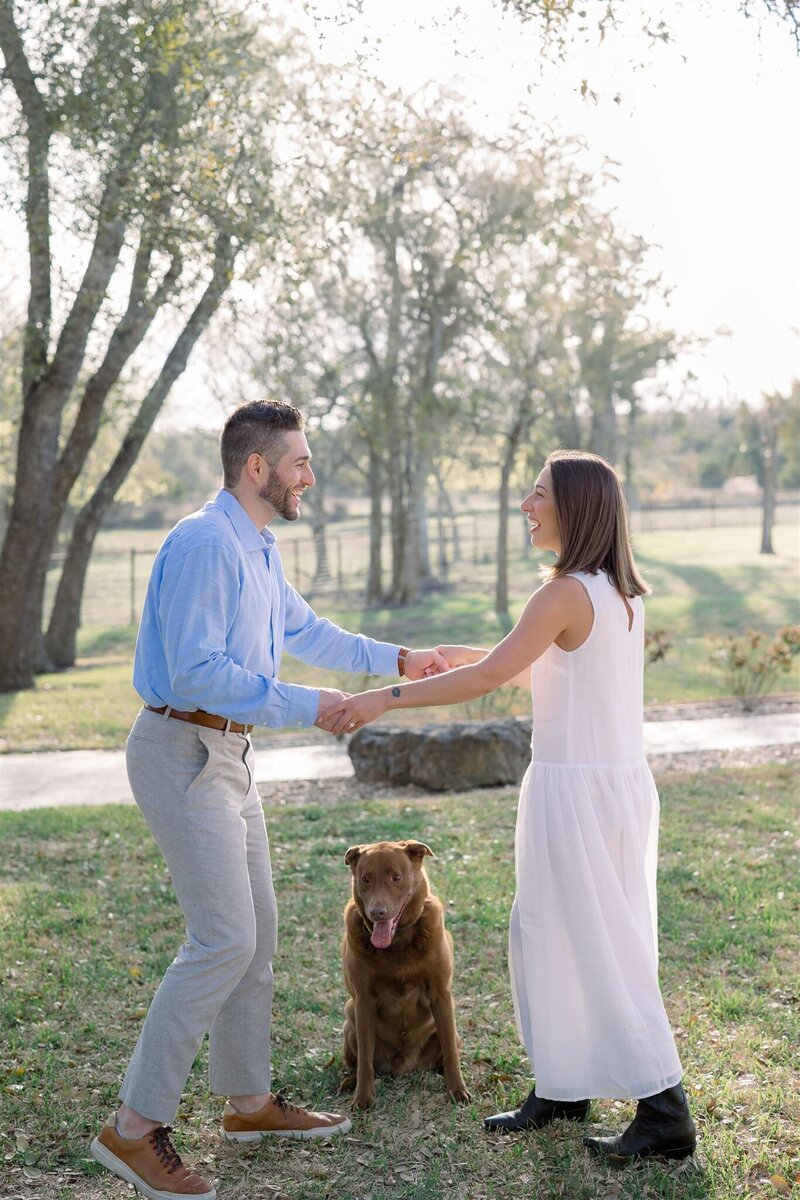 Austin photos engaged couple bouquet of flowers