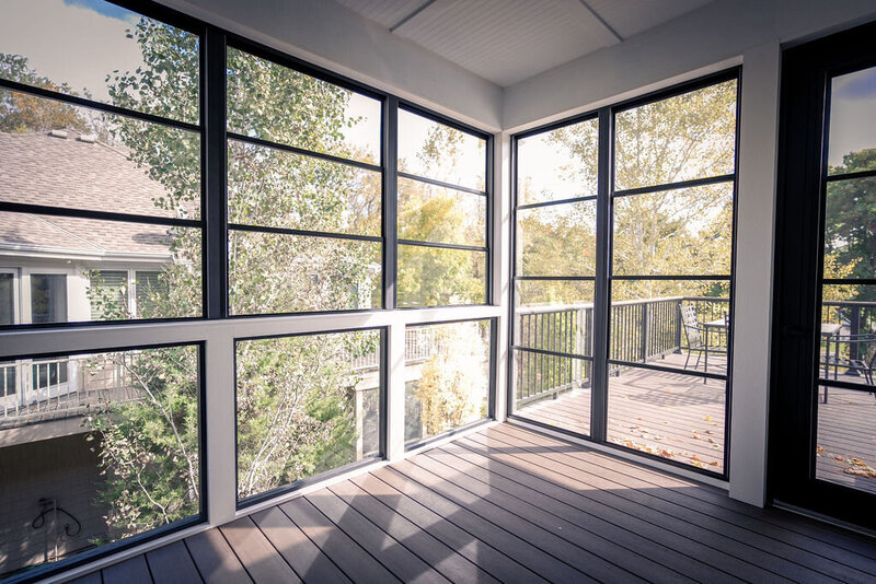 Screened-in porch with vinyl windows and TimberTech deck flooring. 