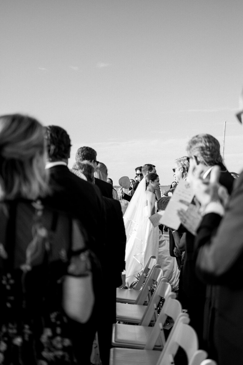 bride and groom walk down the aisle in hilton head