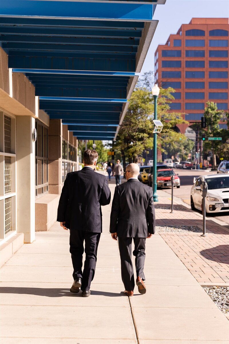 Thom LeDoux and Ramsey Lama walking towards the El Paso County courthouse
