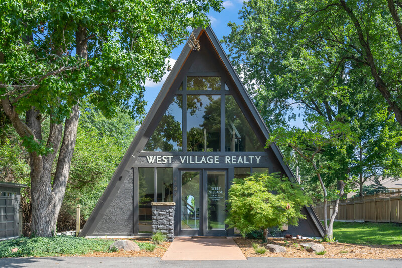 Greenery and office entrance - West Village Realty