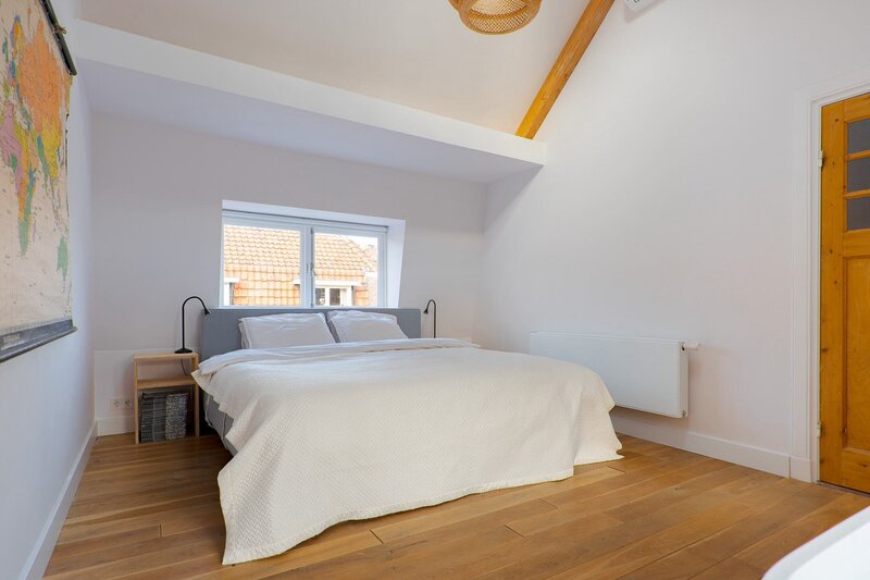 Luxe slaapkamer hoog plafond