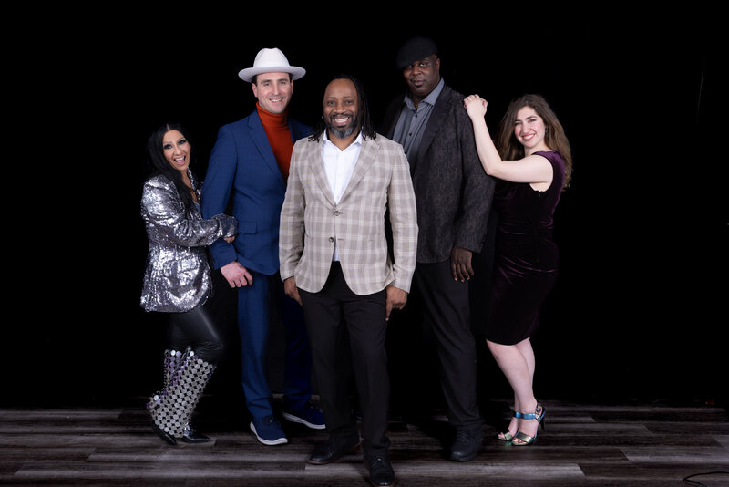 Charizma Entertainment’s Chicago DJ team posing together in front of colorful gradient background