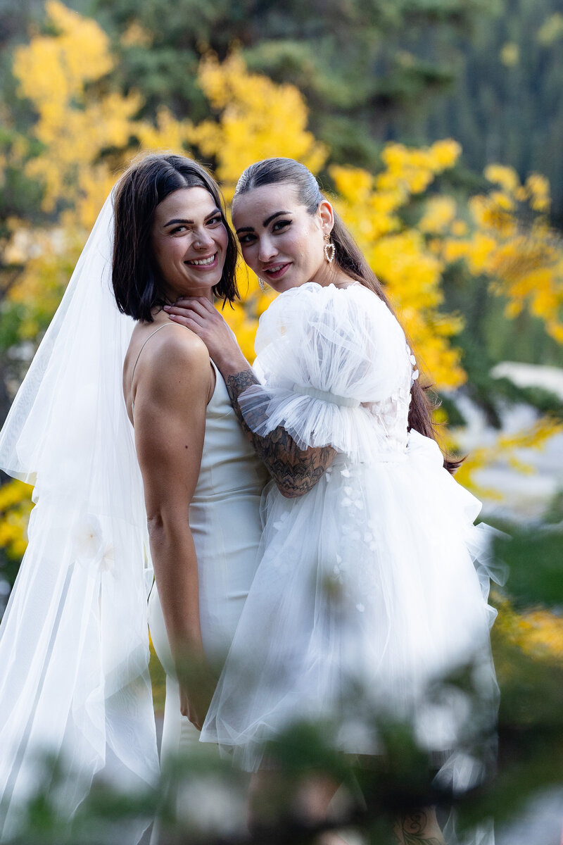 sex couple posing for elopement photos