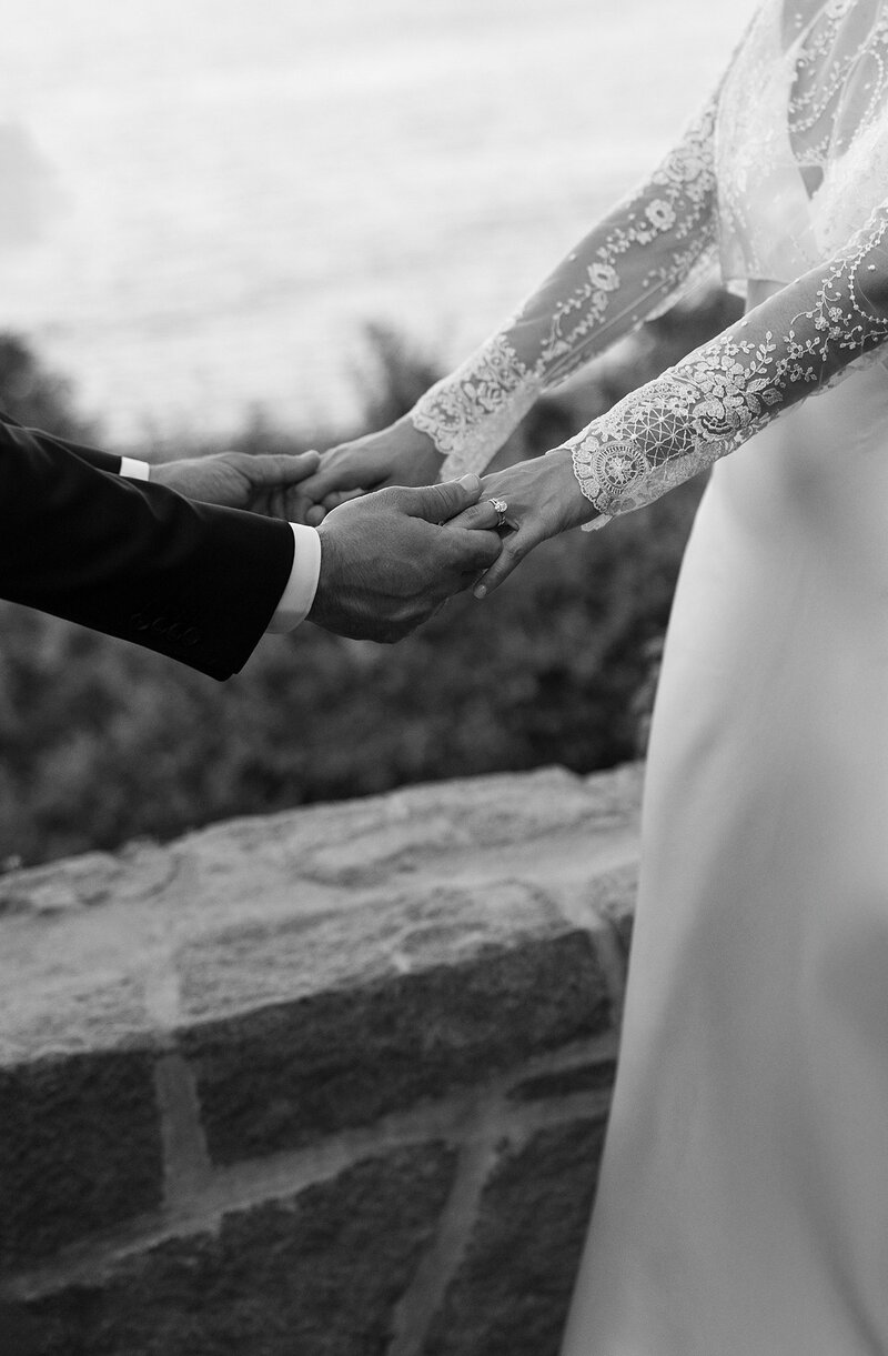 Wedding Couple smile as they walk down the aisle and guests throw rice Deborah Zoe Photography