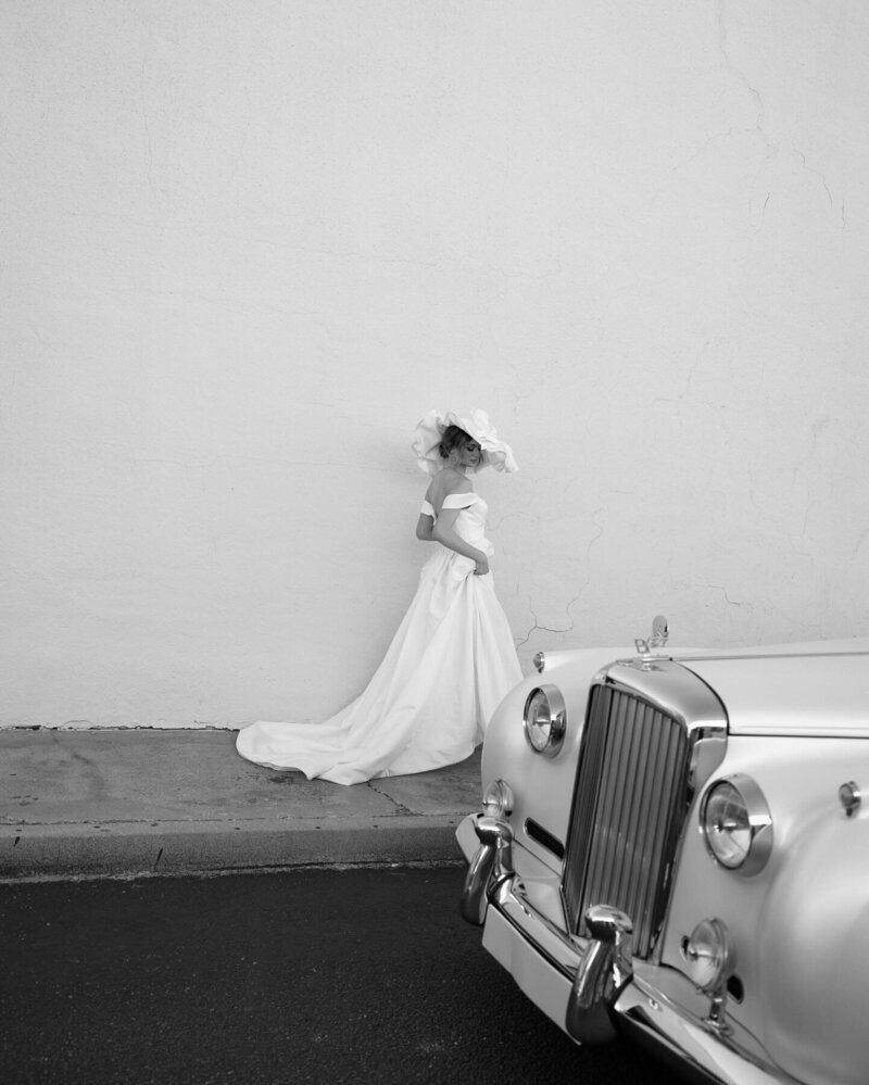 Bride walking through venue in custom gown – romantic European-inspired wedding captured in Mexico