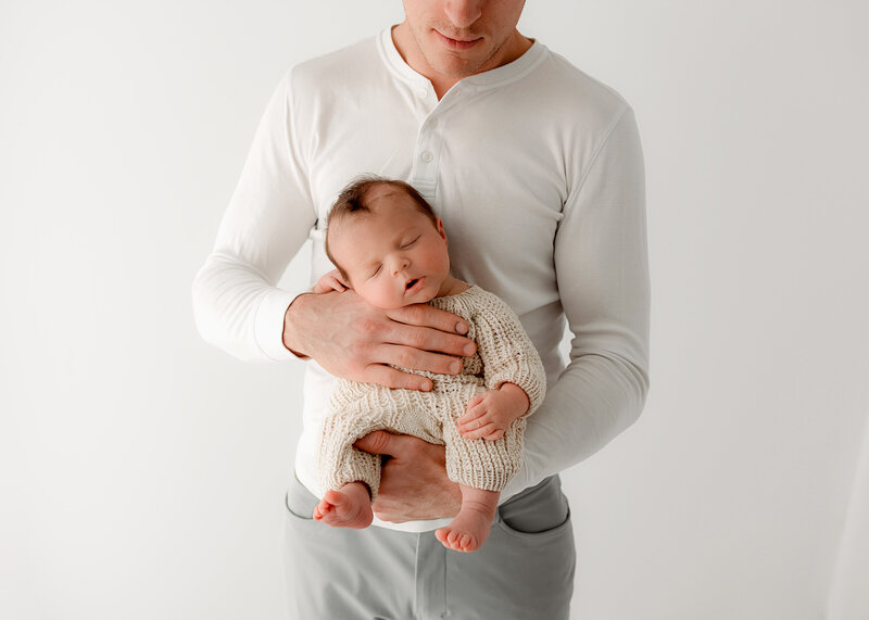 Newborn photographer in Fort Collins studio with natural light