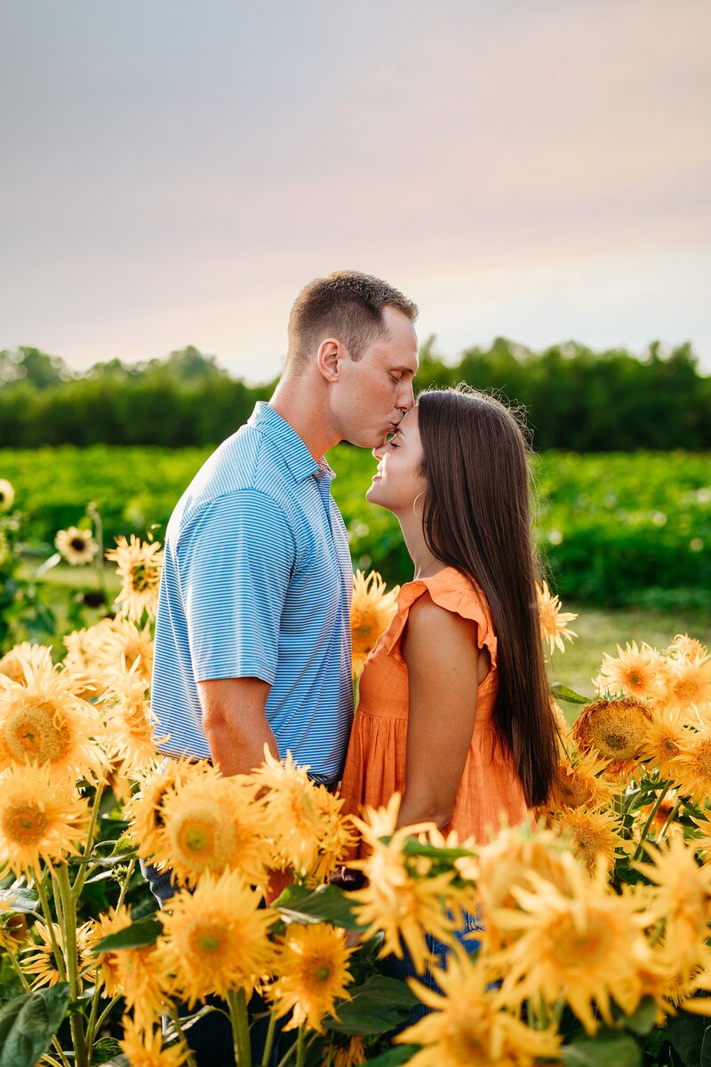 engagement photo in sunflowers