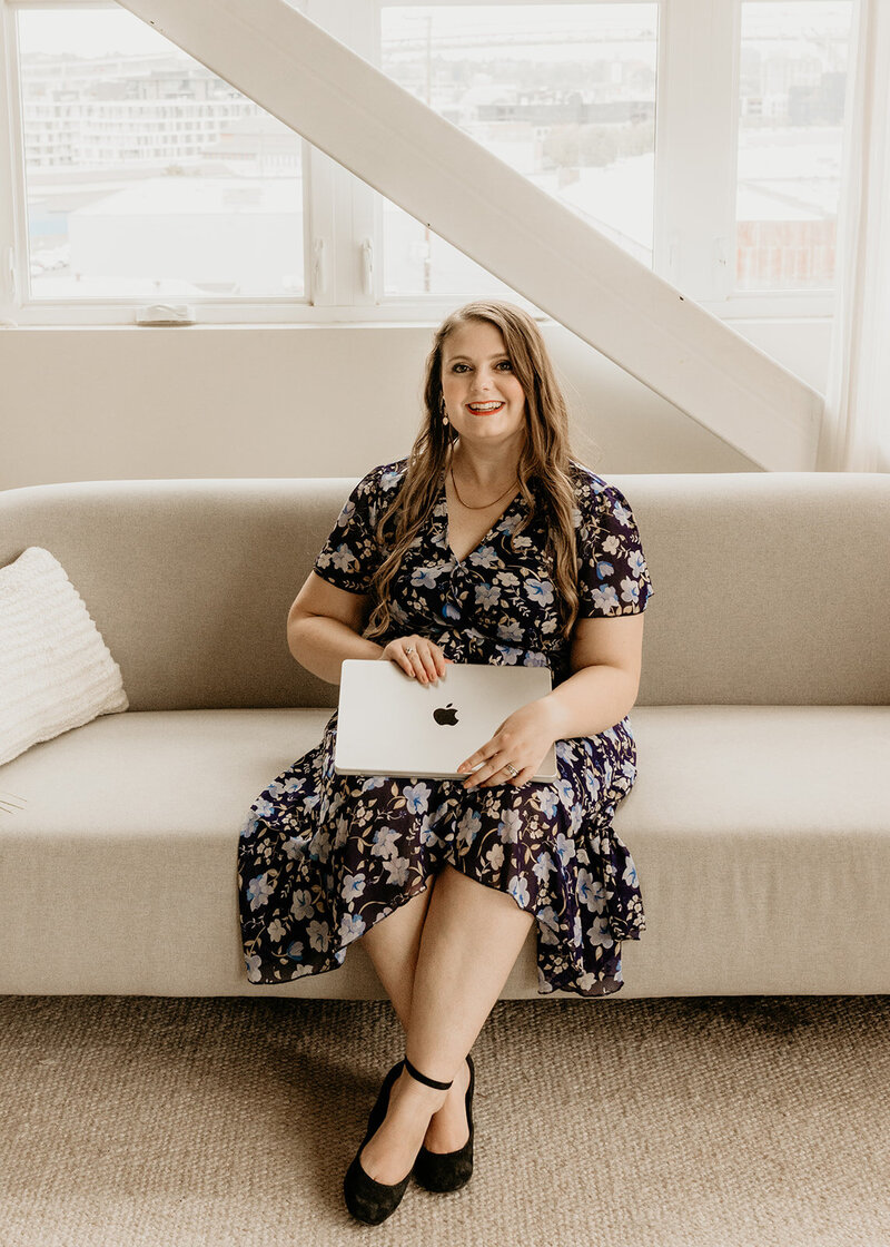 Graphic designer looking through book