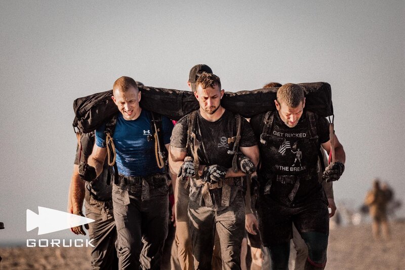Ruck training challenge during GORUCK event showcasing strength and teamwork.