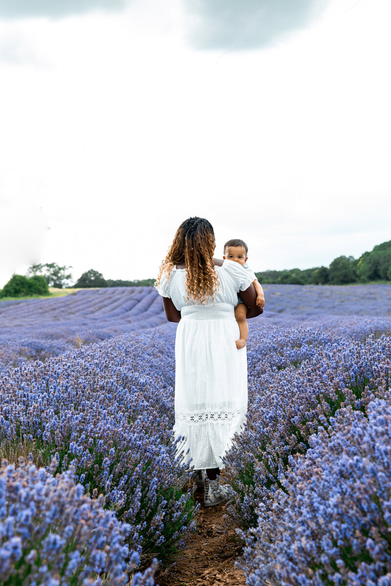 Mother and baby during outdoor photo session in Lavender Fields