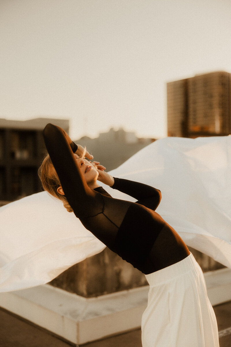 Sunshine Coast branding photography featuring a creative portrait of a woman with a camera.