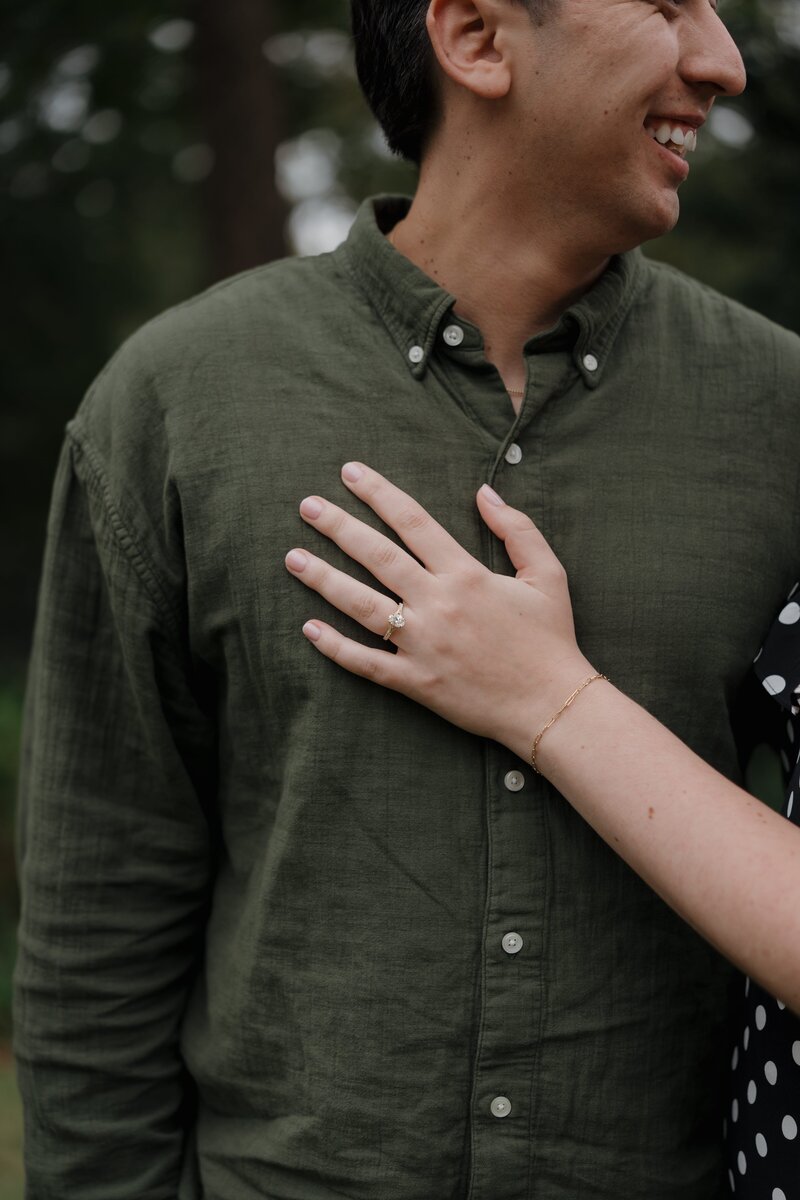 Hand showing off Engagement ring after proposal in Marietta.
