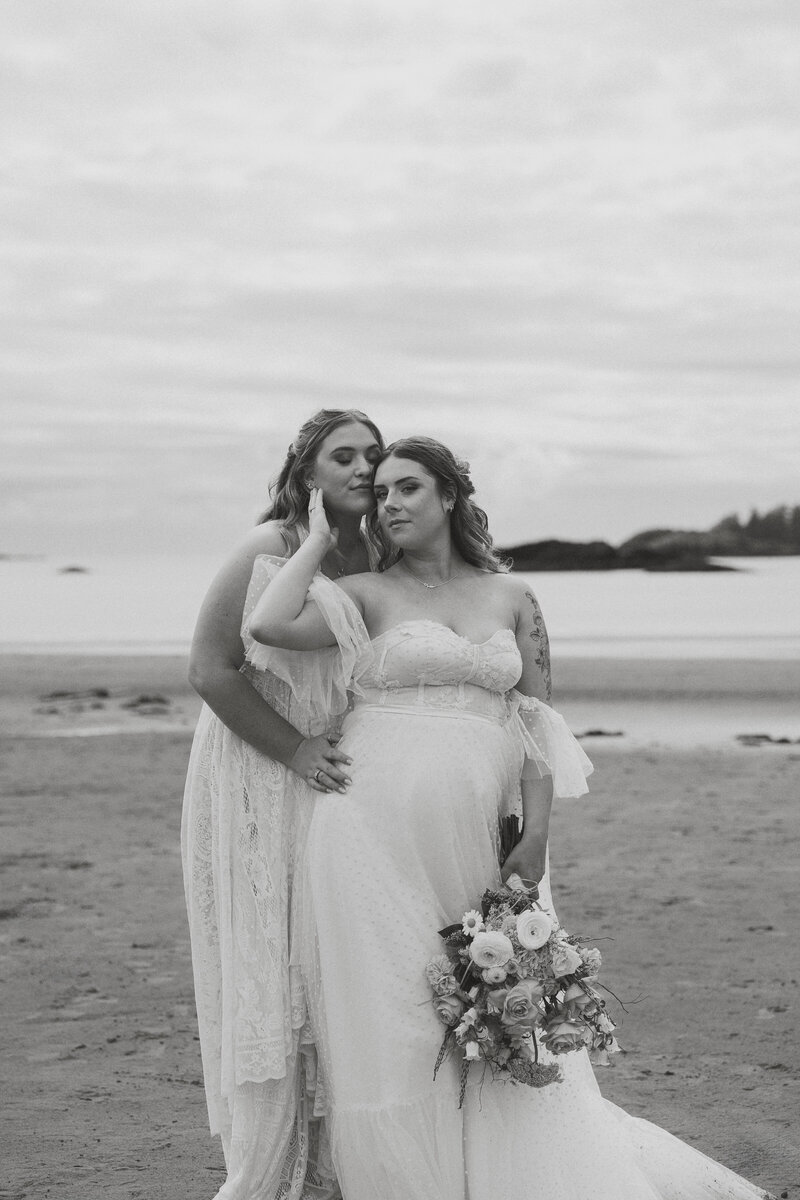 two brides in embrace at their west coast elopement