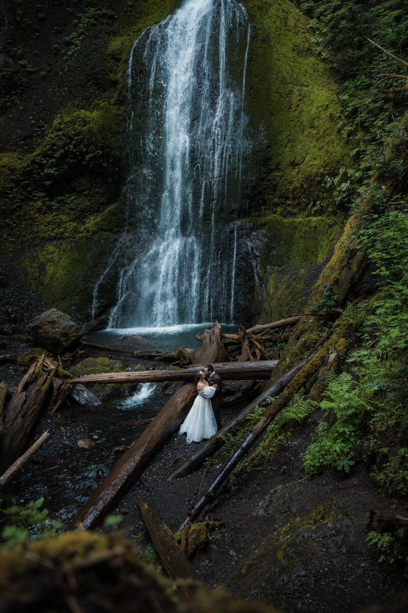 waterfall elopement at marymere falls in olympic national park