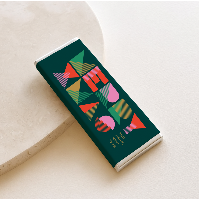 No. 1 personalised luxury chocolate place card in Australia with guest name in gold foil, styled for a luxury wedding tablescape — Barilliant.