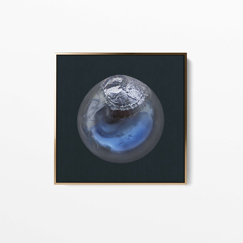 Fine Art Canvas with a gold frame featuring Project Stardust micrometeorite NMM 2752 collected and photographed by Jon Larsen and Jan Braly Kihle