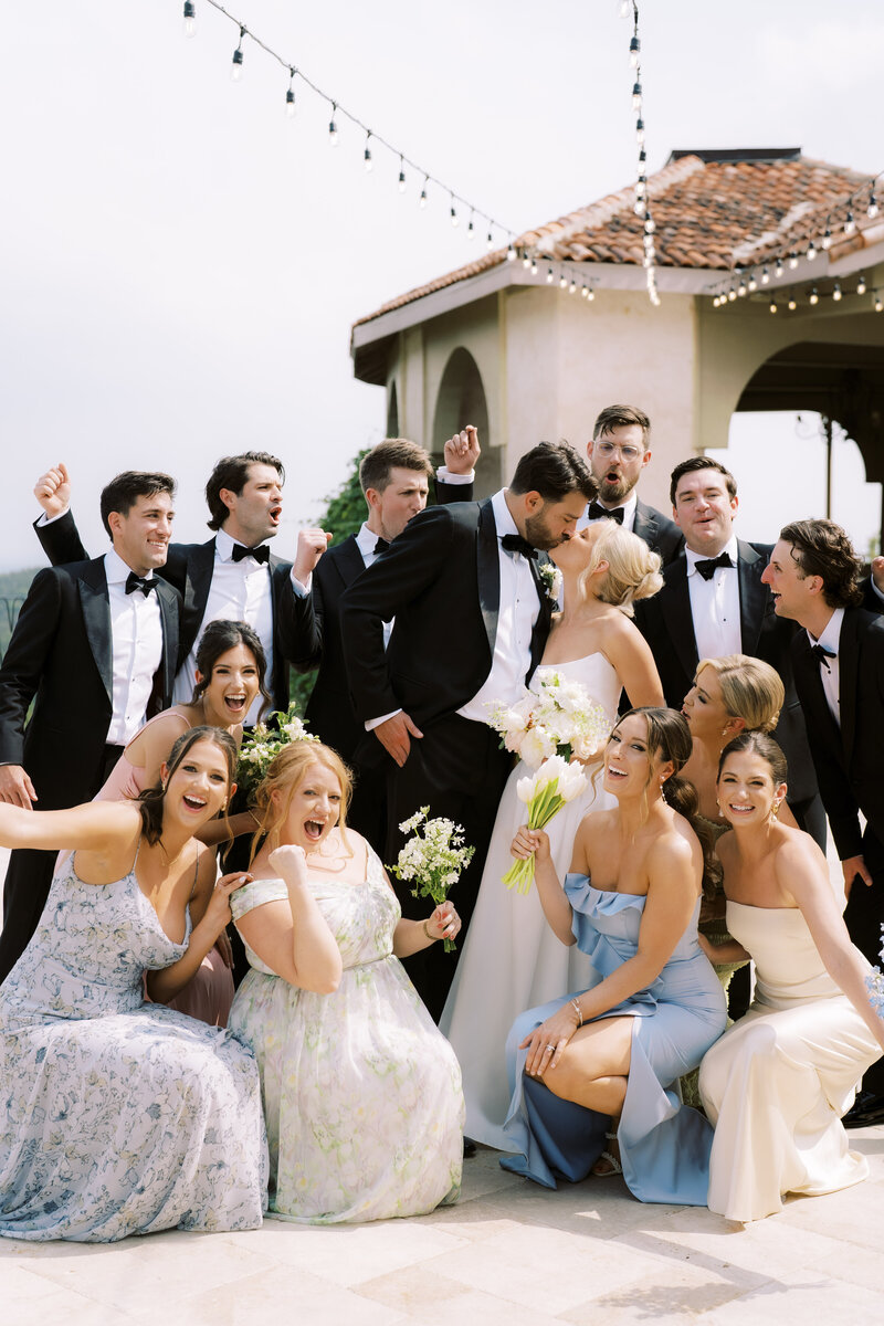 Wedding party celebrating the couple after wedding ceremony
