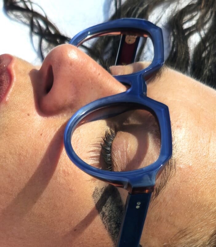 Detailed close-up of LINDBERG glasses sold at Colaizzo Opticians, a high-end eyewear boutique in Seattle