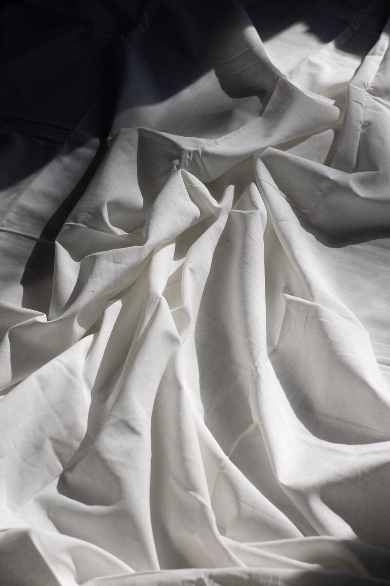 black and white image of bunched fabric