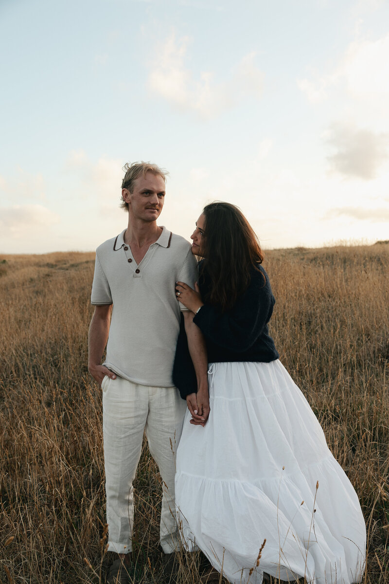 couple posing on melbourne beach