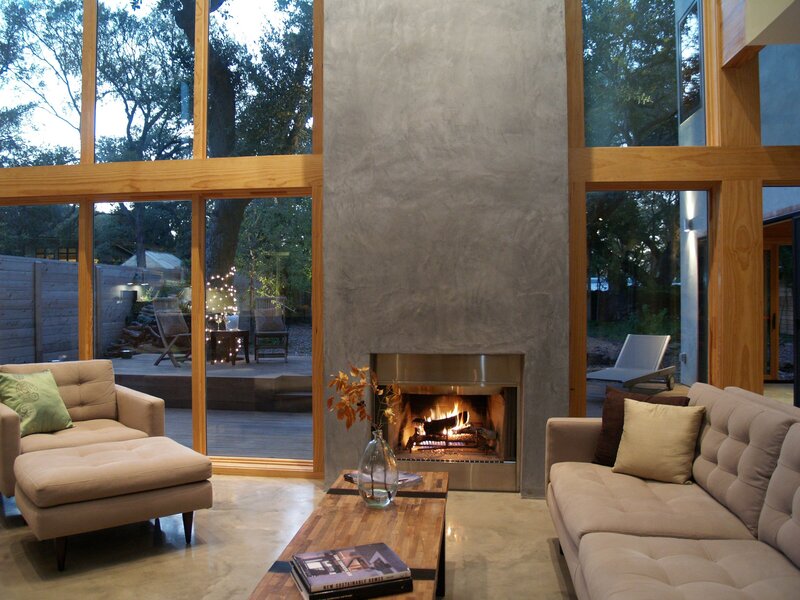 custom fireplace in concrete wall. modern home architecture in central texas.