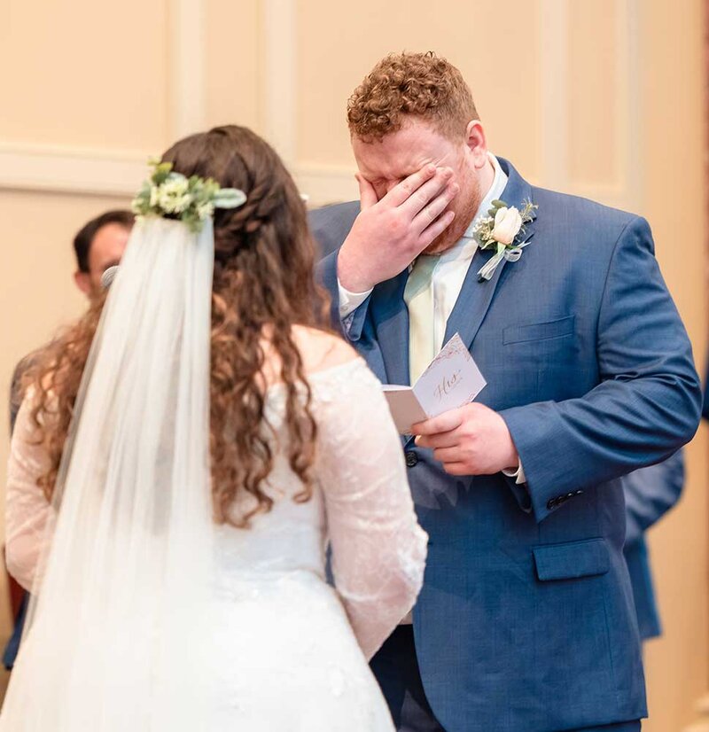 Groom getting emotion during vows Virginia wedding photographers
