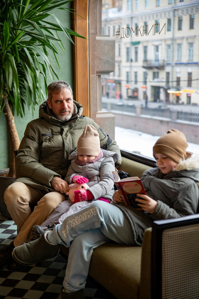 Cozy seating area overlooking children’s play zones at Petit Play Café
