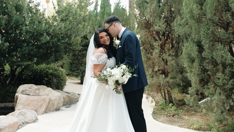 Bride and Groom posing at JW Marriott Las Vegas Wedding Venue captured by Sierra Lee Films