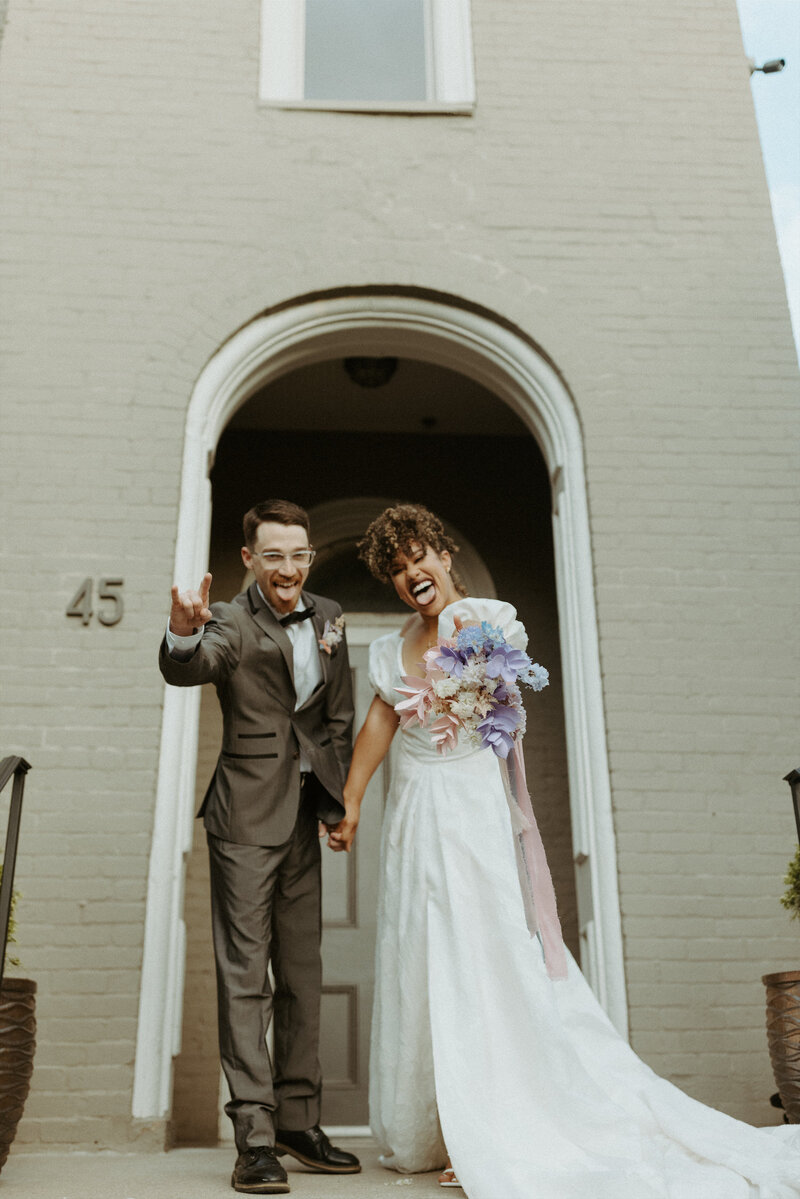 wedding couple in front of chapel