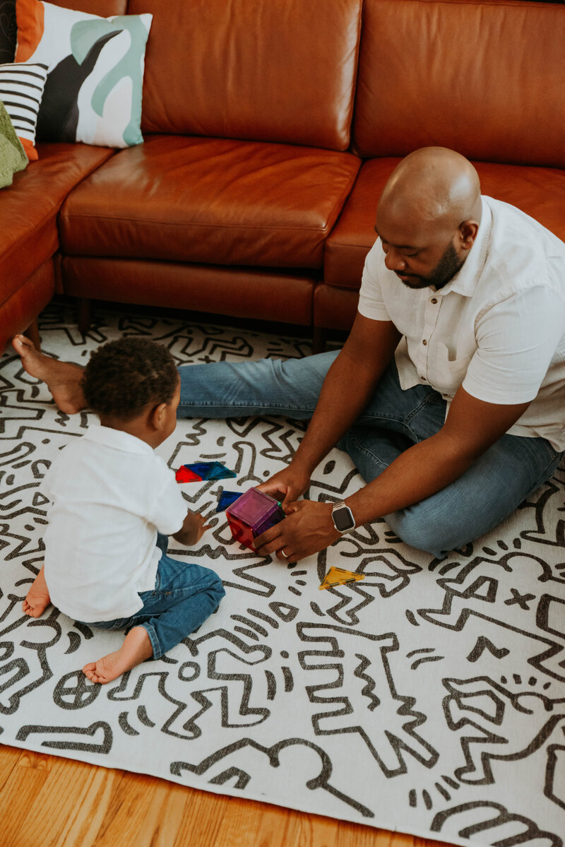 winter family session in field with light whispy grass kattie jackson photography georgia family photographer 