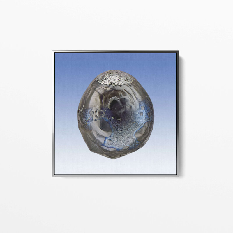 Fine Art Canvas with a silver frame featuring Project Stardust micrometeorite NMM 628 collected and photographed by Jon Larsen and Jan Braly Kihle