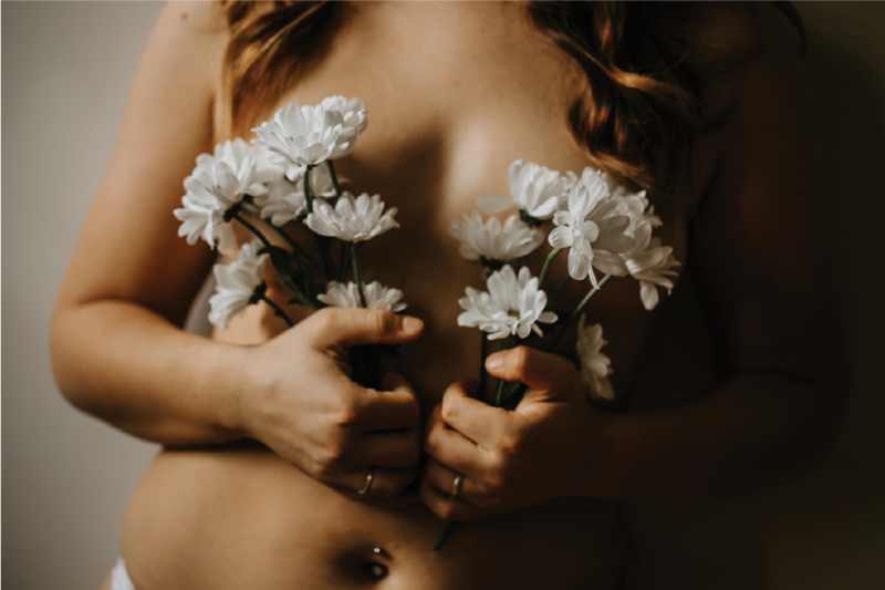 woman-holding-flowers@2x