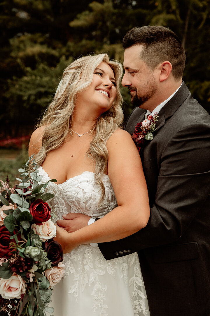 Bride and Groom Portrait at Rotary Botanical Gardens in Janesville, Wisconsin. Taken By Cree La Vie Studios.