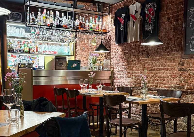 Inside dining room at Osteria La Dritta in Lucca, Italy