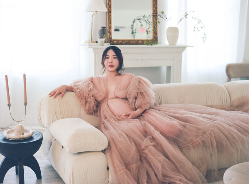 maternity gown on luxury sofa