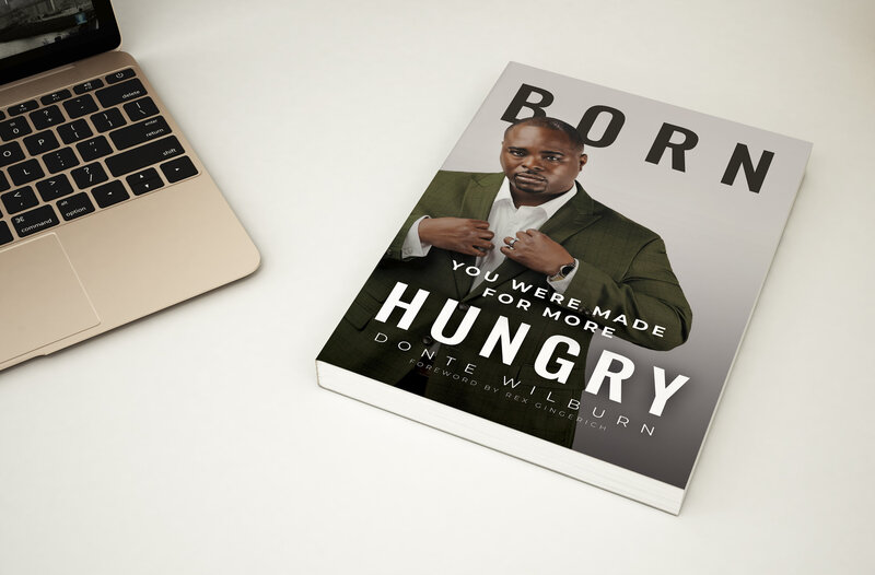 Born Hungry book laying next to laptop