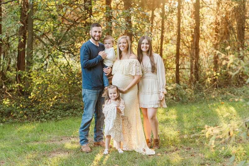 family posing during maternity session by york pa photographer