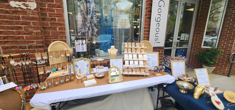 SAVA Event and blue mountain jewelry table set up 