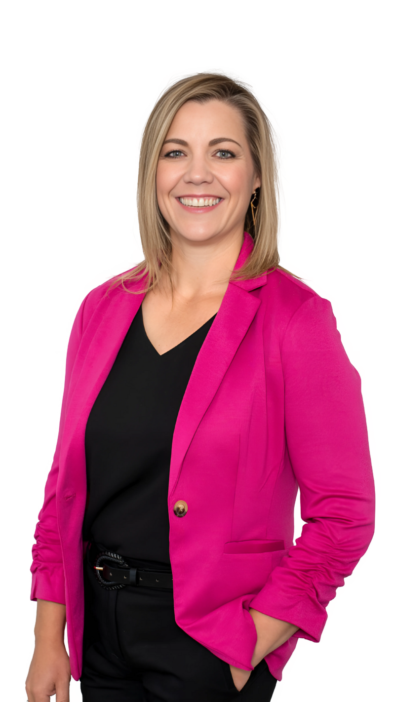 nna James, a professional real estate agent with blonde hair, smiles warmly