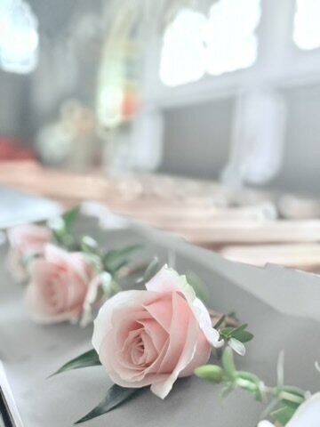 A real pink rose buttonhole.