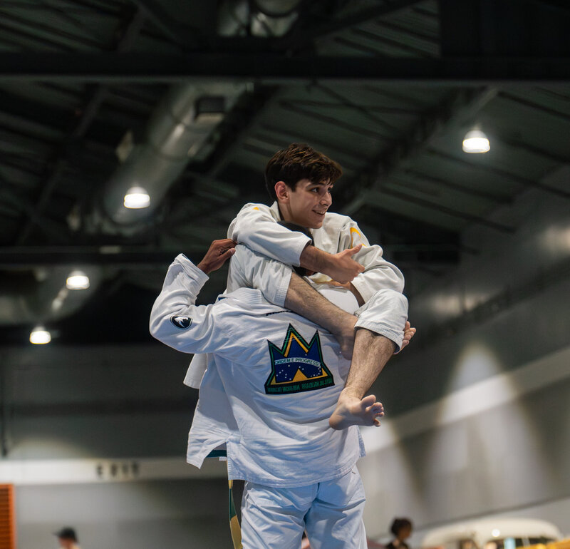 PNW grappler at IBJJF in a head arm triangle attempt