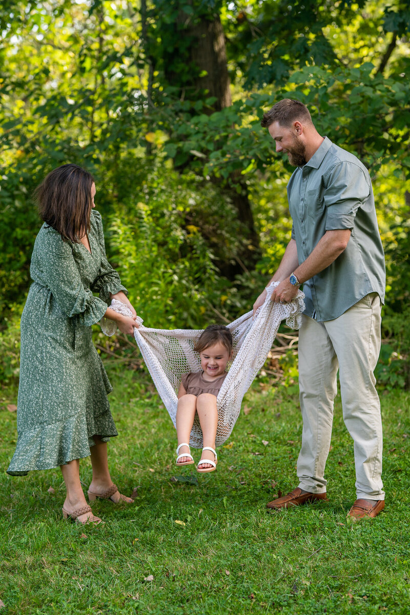 mom and son smiling and twiriling by wallace lake berea ohio